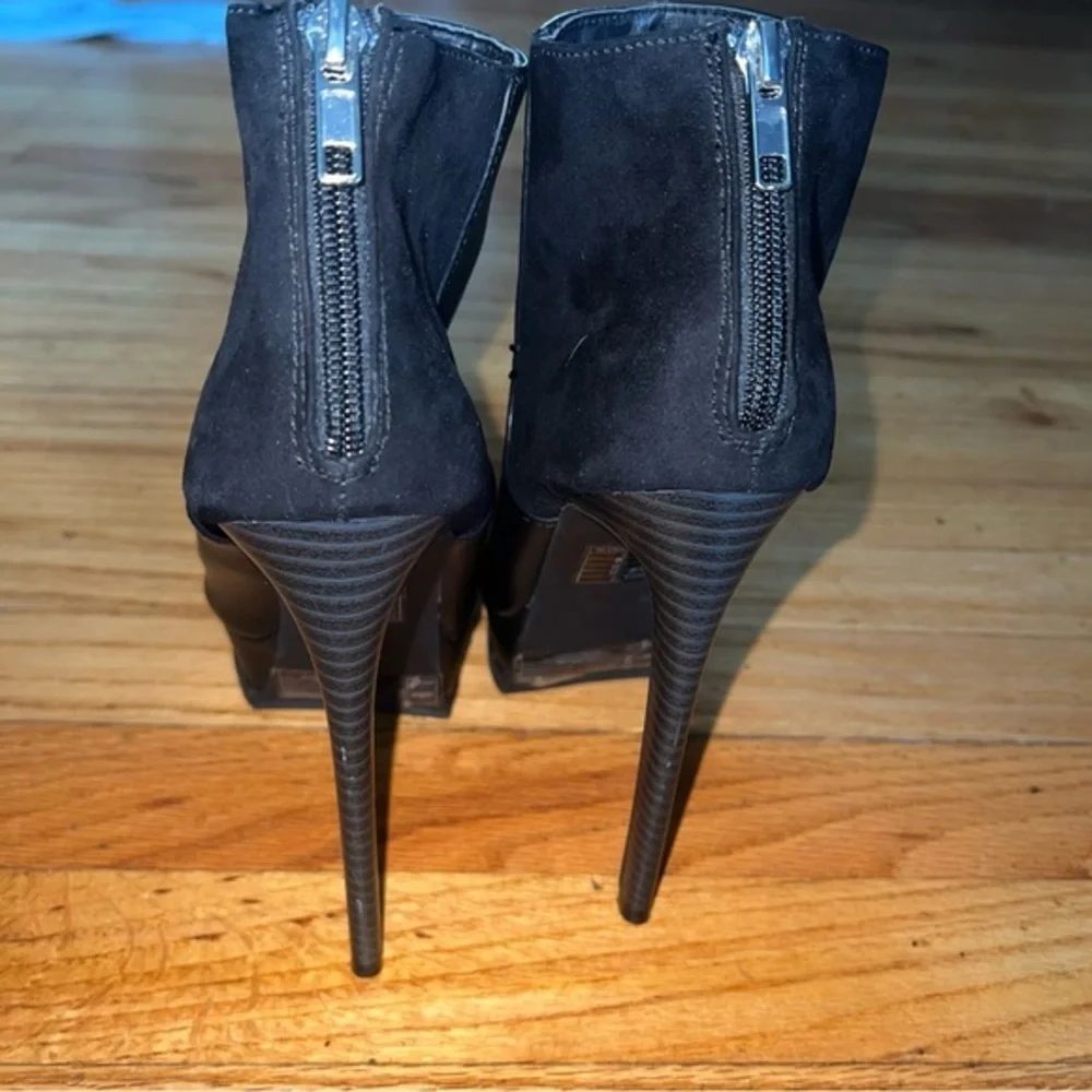 NWOT platform stiletto booties with zipper back